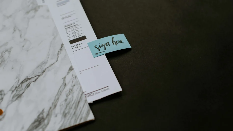 Navigator Petroleum Calgary Contracts Contract with a sign hear sticky note