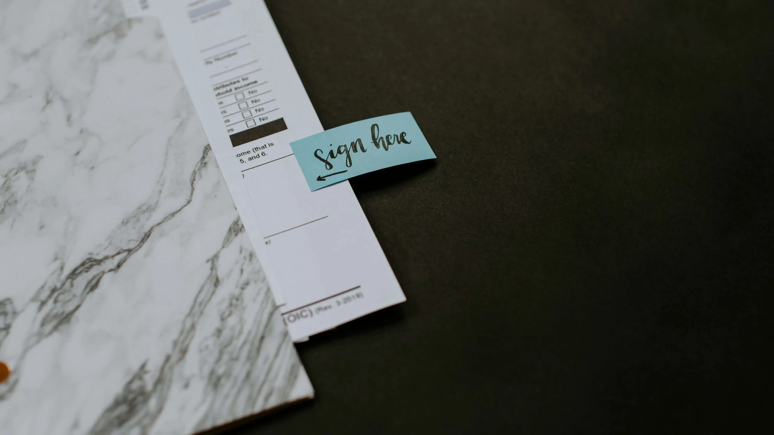 Navigator Petroleum Calgary Contracts Contract with a sign hear sticky note